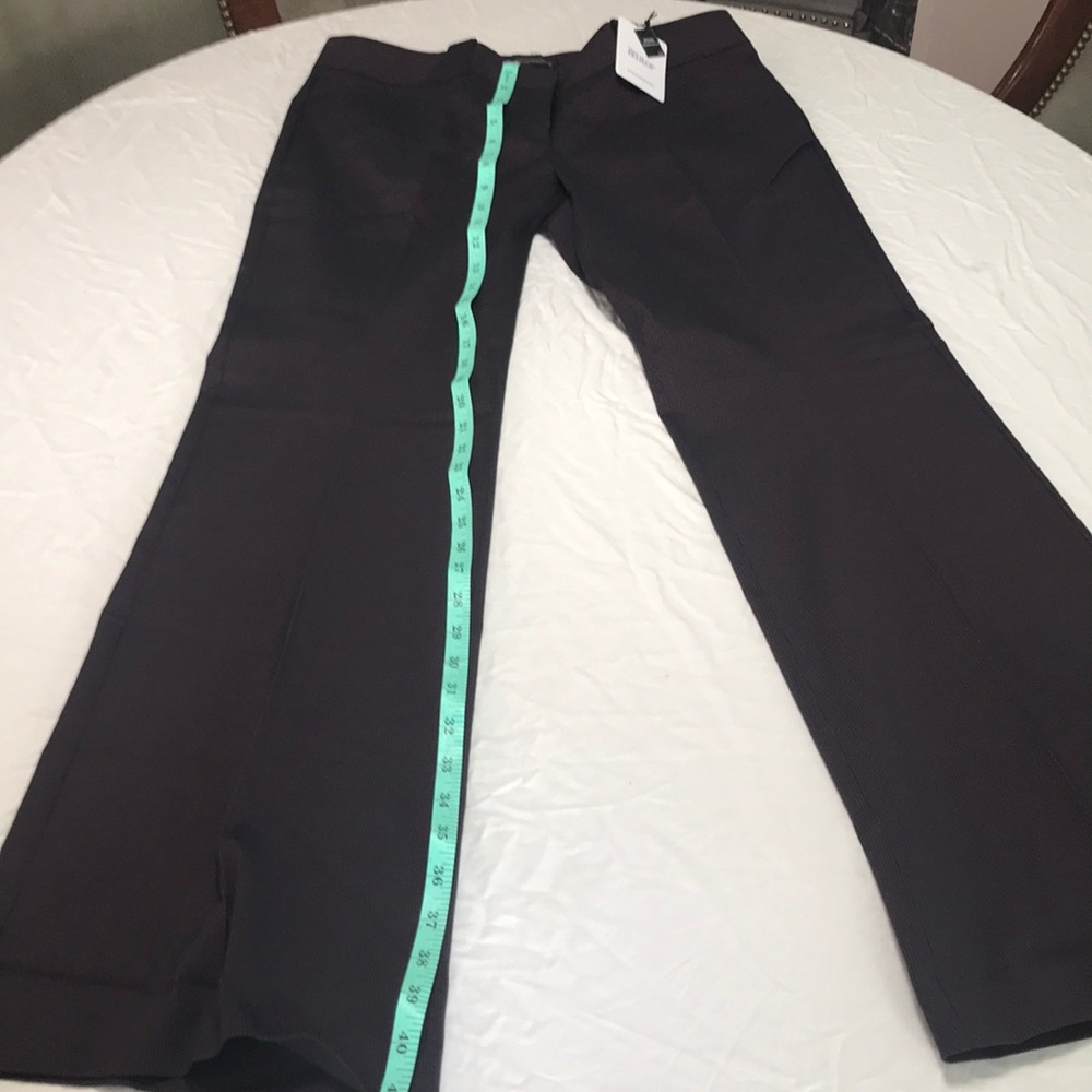 Black with red pin-striping.